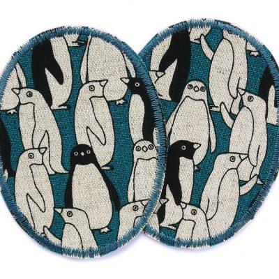 2 Pinguin-Knieflicken aus petrolfarbenem Baumwollcanvas mit verschiedenen Pinguinen Allover-Muster, jeweils 6 x 8 cm, schmale ovale Bügelflicken für Kinderhosen handmade Berlin