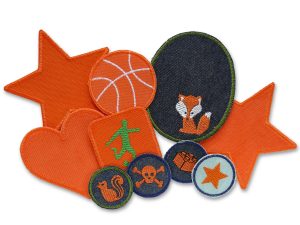 Bügelflicken und Aufnäher in der Farbe orange. Alle Flicken handmade in Berlin